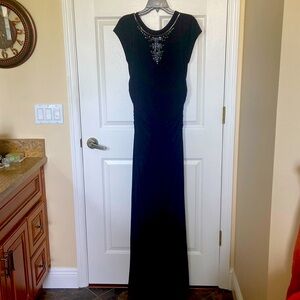 Long, exquisite gown, sleeveless jeweled neckline, stretchy waist, very slimming